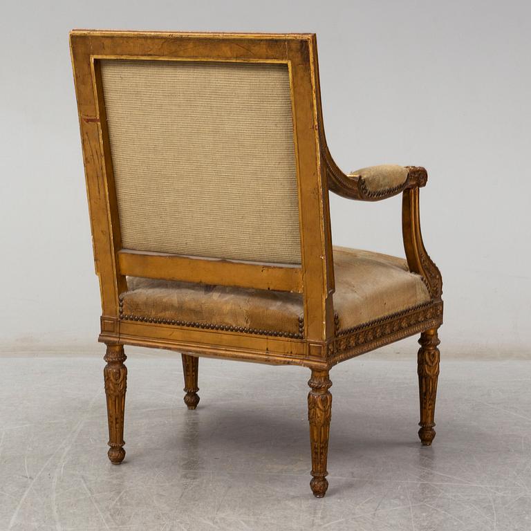 A late 19th century Louis XVI-style armchair.