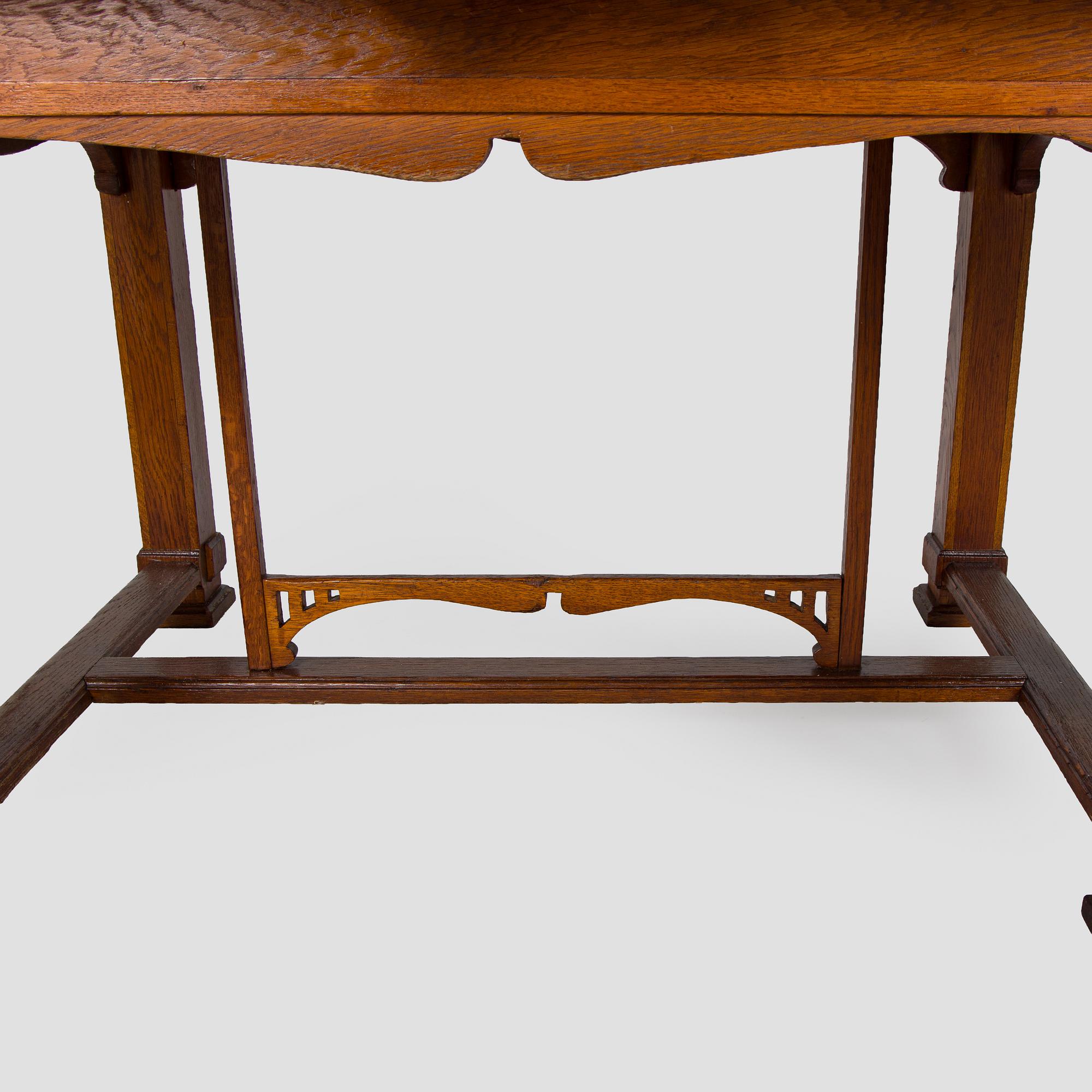Dining table and six chairs, early 1900.