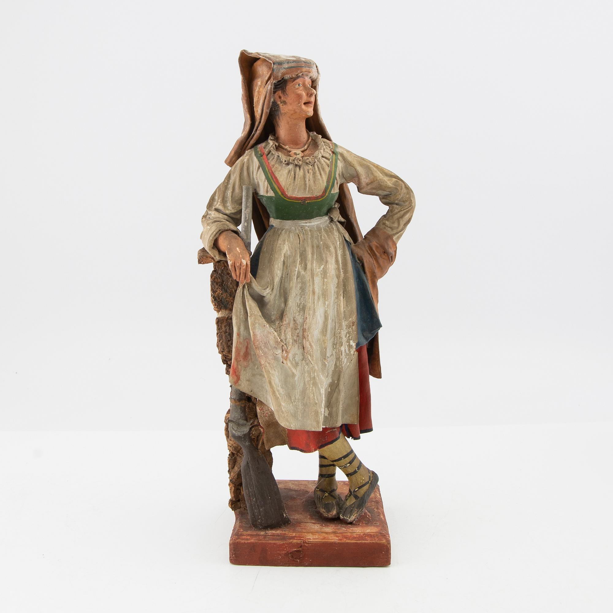 Figuriner ett par Italien omkring 1900.