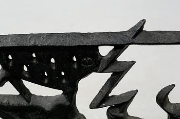 1960s cast iron spark protection by Olle Hermansson.