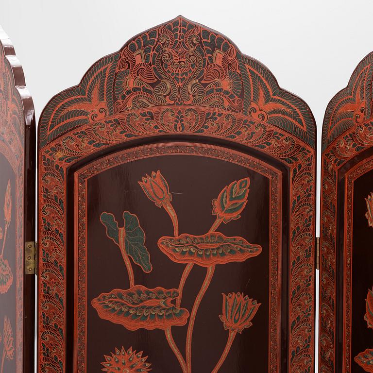 A folding screen, south east Asia, second half of the 20th century.