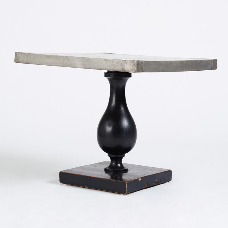 Uno Åhrén, a black lacquered table with a pewter top by Nils Fougstedt, Svenskt Tenn ca 1930. Alva & Gunnar Myrdal Collection.