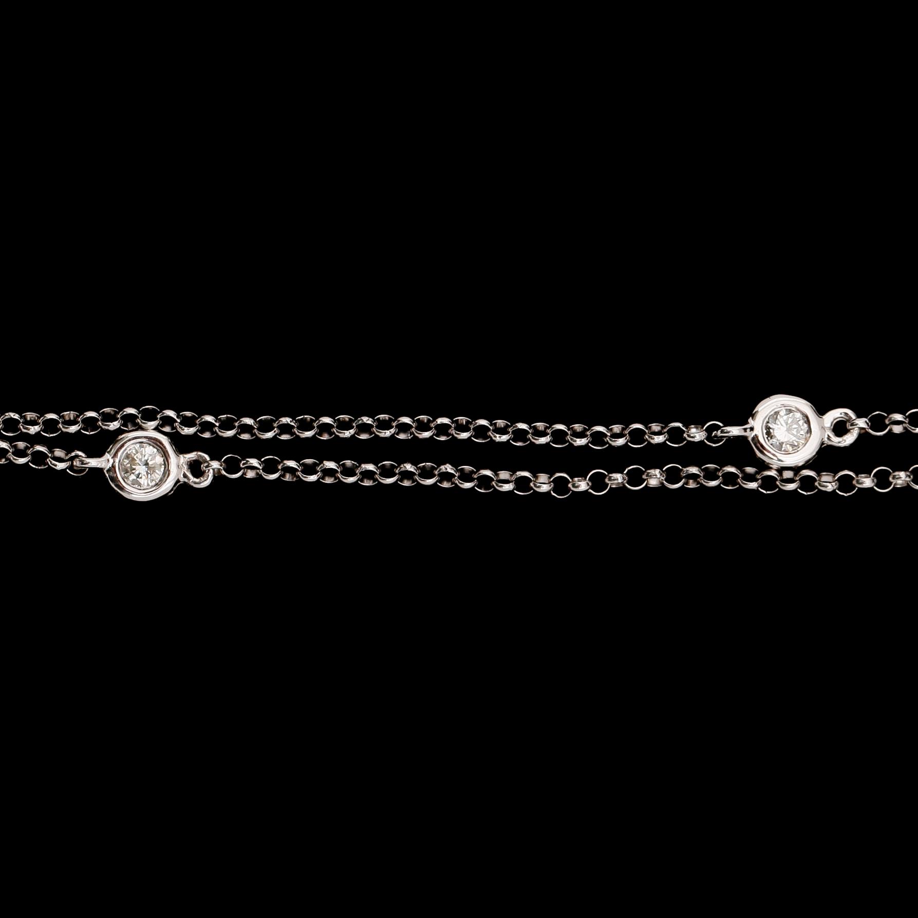 COLLIER, 18 k vitguld, smaragd ca 1.86 ct, briljantslipade diamanter tot ca 0.94 ct.