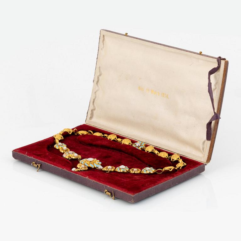 An 18K gold and enamel necklace set with pearls and half pearls.