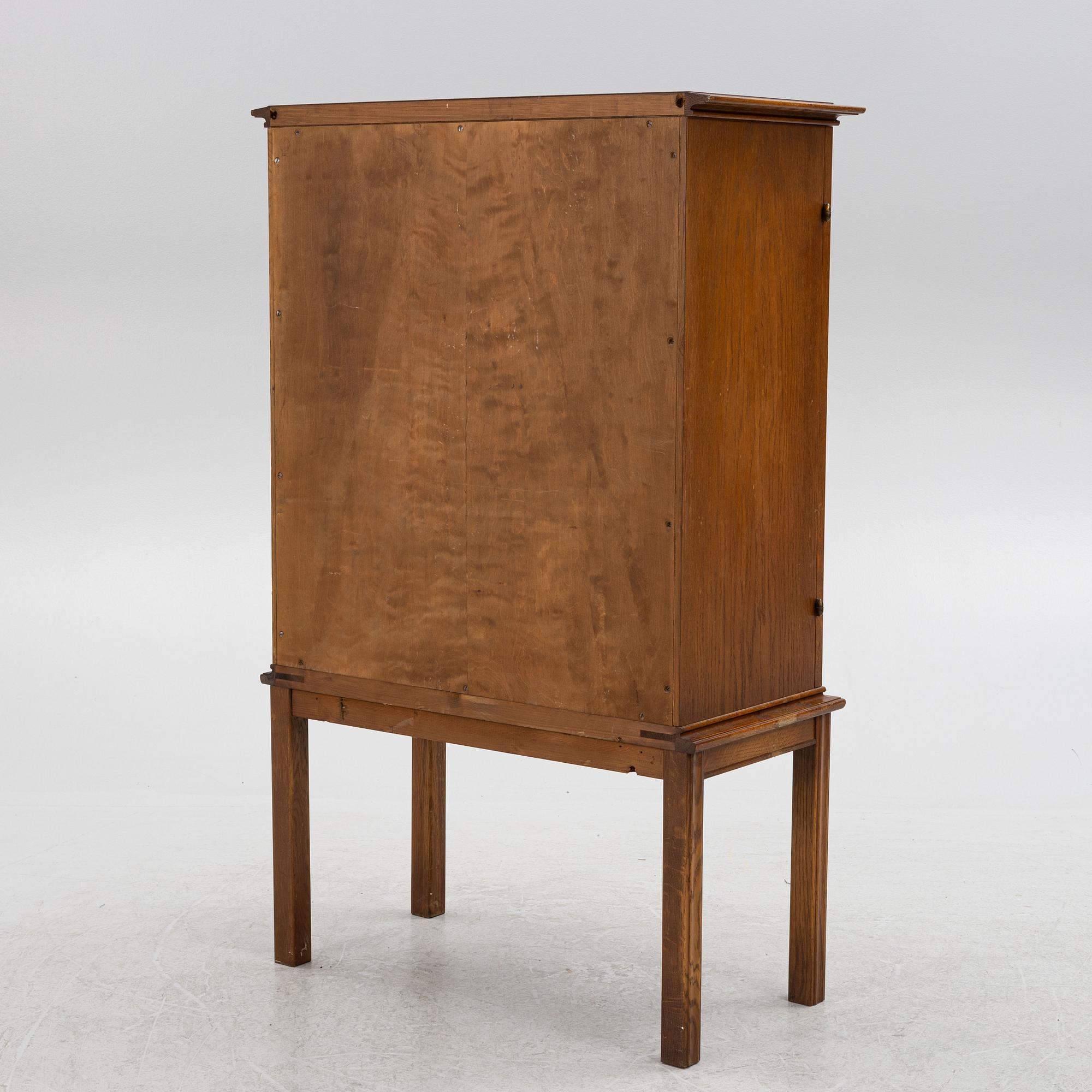 Oscar Nilsson, attributed to, a Swedish Modern oak cabinet, likely executed by Åfors Möbelfabrik, 1940s.