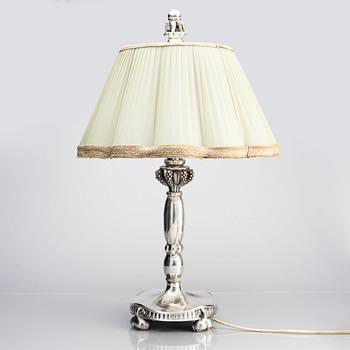 Georg Jensen, a table lamp, Copenhagen 1919, 830/1000 silver, design nr 79.