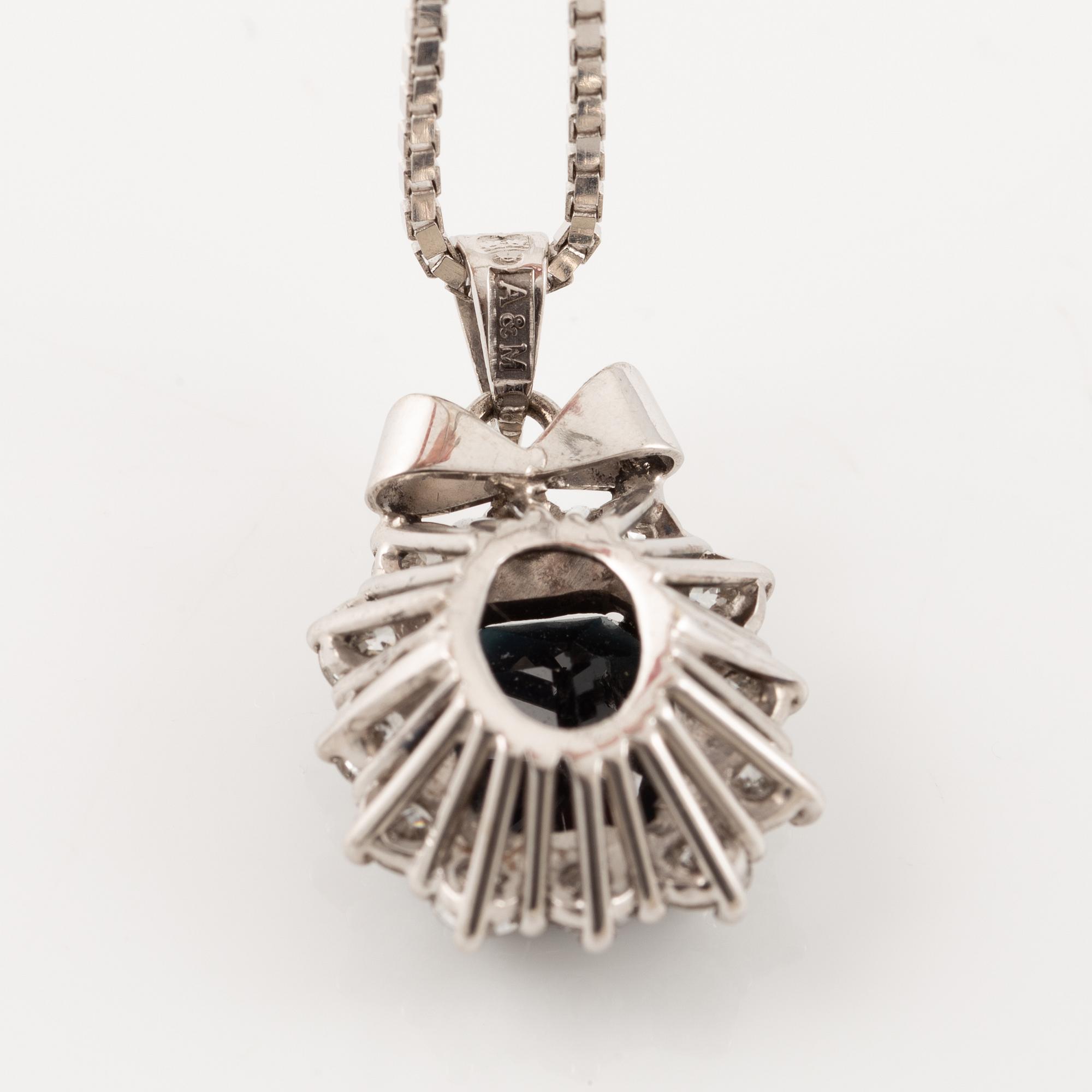Pendant, Lennart Magnusson, 18K white gold with dark sapphire and brilliant-cut diamonds, chain included.