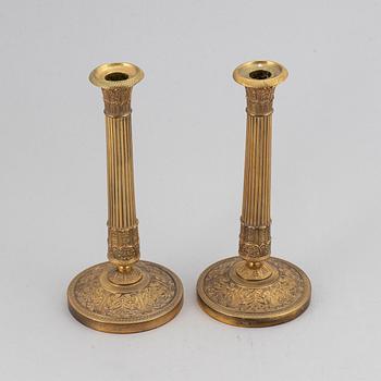A pair of candlesticks, empire style.
