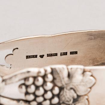 A silver sugar tong and a 3-piece silver coffee set, mark of Juho H. Pekuri, Oulu 1931 and Finnish import marks 1938.