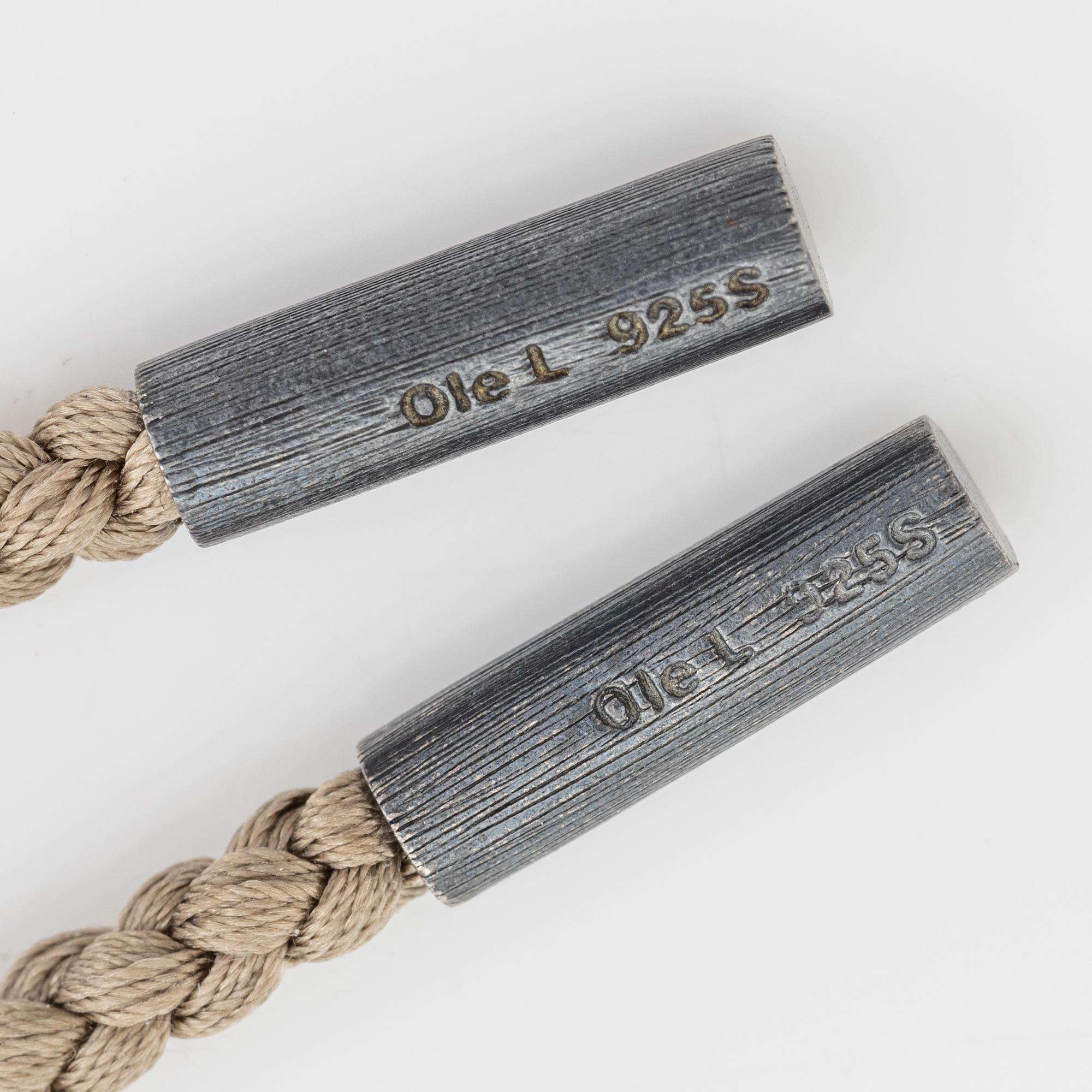Ole Lynggaard,  "Sweet drop" pendant silver with smoky quartz, with textile band.