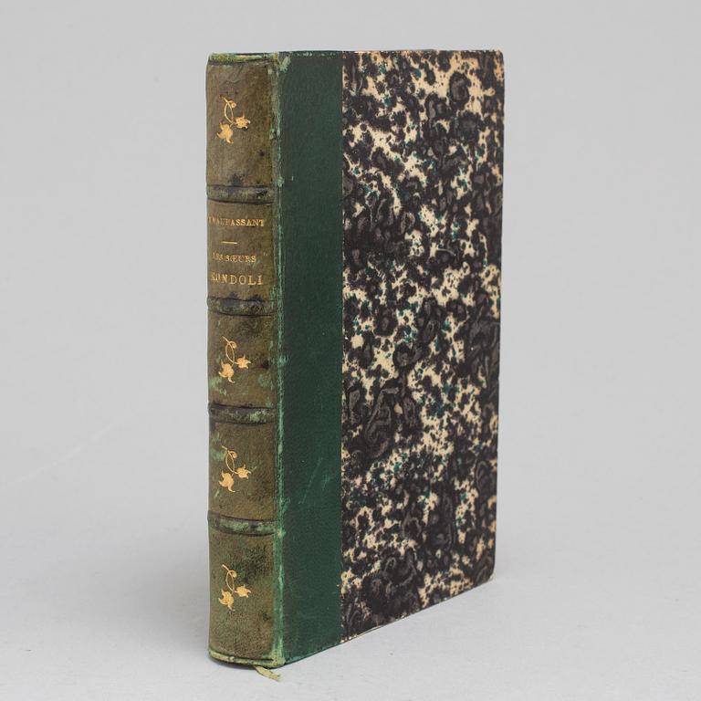 BOOK, inscribed by Maupassant.