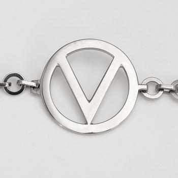 VALENTINO, a chain belt.