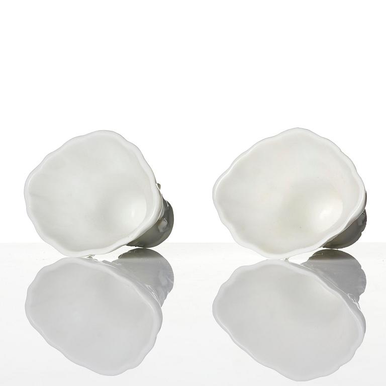 Two blanc de chine rhinoceros libation cups, Qing dynasty, Kangxi (1662-1722).