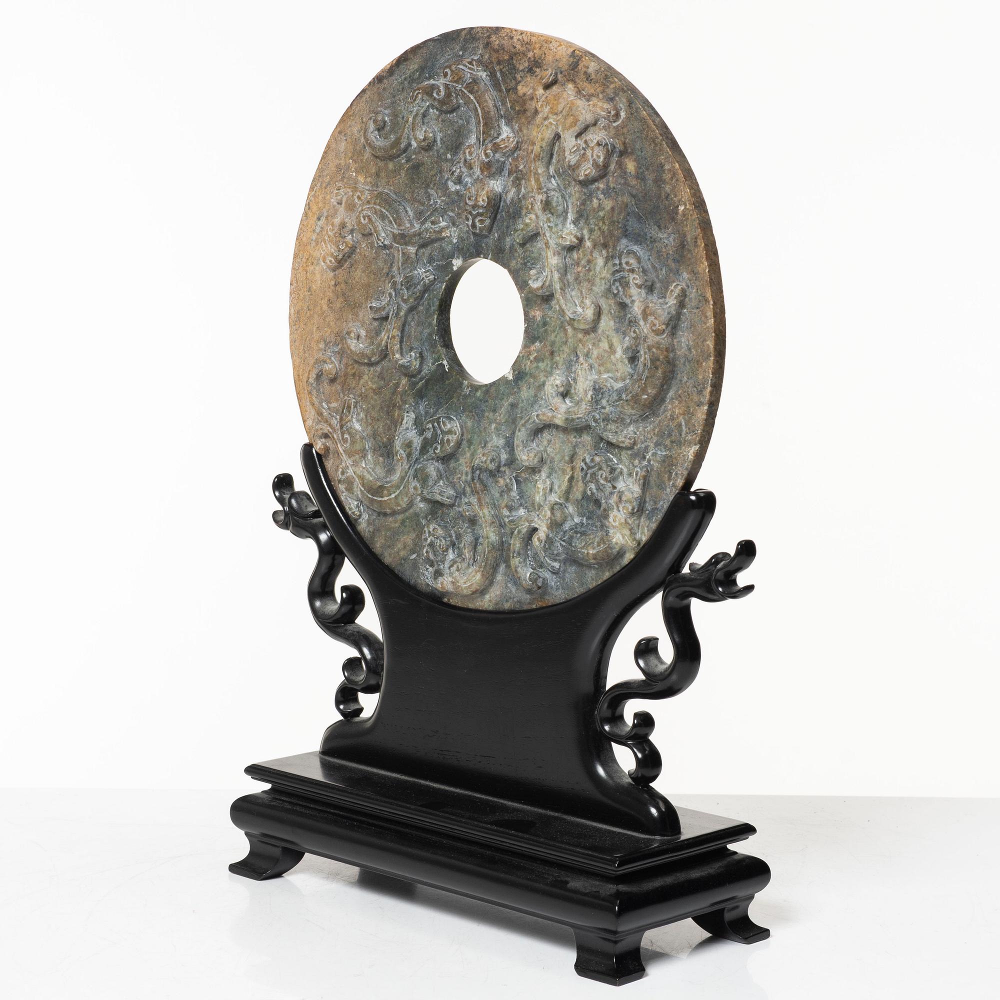 A Chinese stone bi-disc, 20th century.