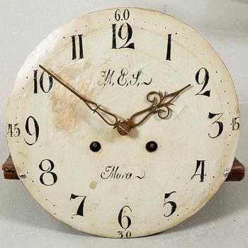 A grandfather clock dated 1823.