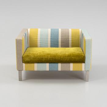 An armchair, Designers Guild Furniture, England.