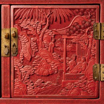 A carved  lacquer 'Kang'Cabinet, Qing dynasty, 18/19th Century.