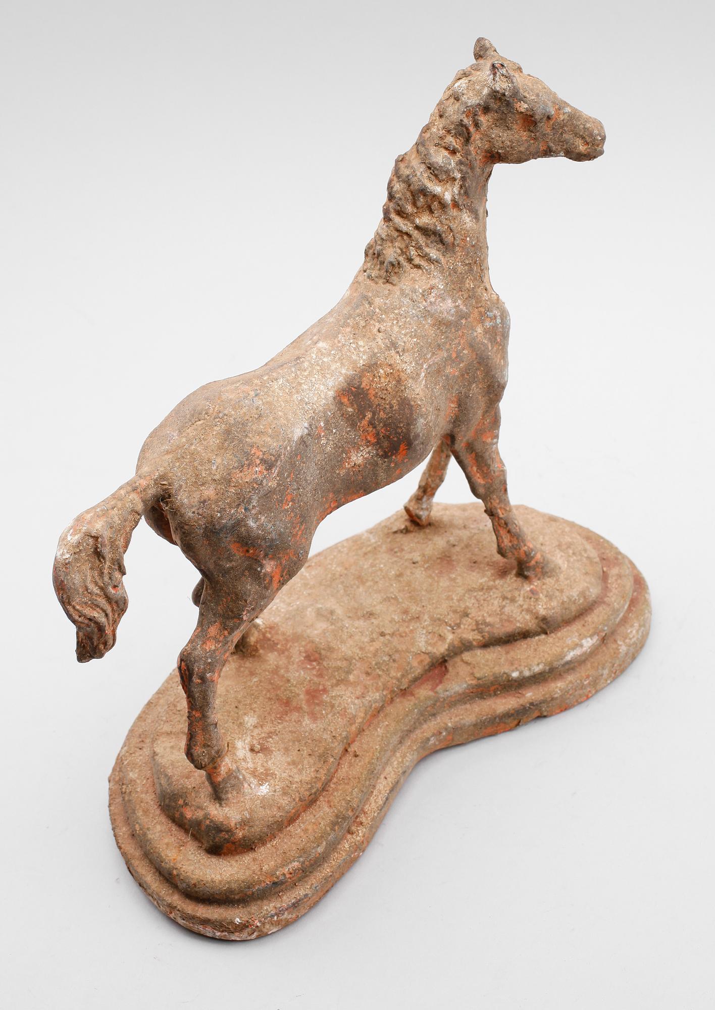 DÖRRSTOPP. gjutjärn, 1900-talets första hälft.