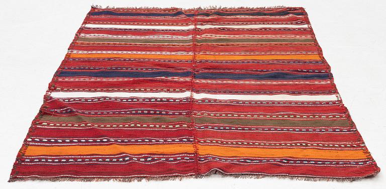 A Djajim rug, Aliabad, Hunza district, c 196 x 132 cm.