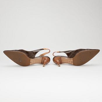 LOUIS VUITTON, a pair of brown monogram patent leather lady's shoes.