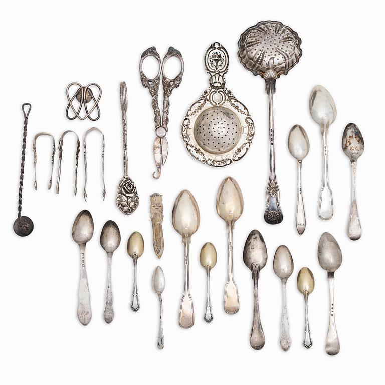 Cutlery, tea strainer, bookmarks etc., 24 pieces, silver, 19th-20th century.