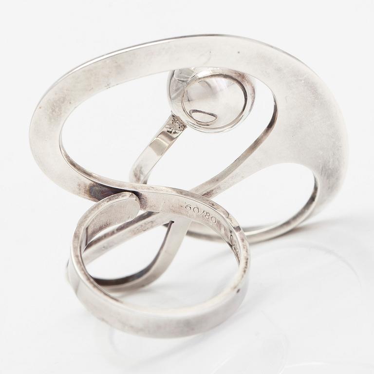 Paula Häiväoja, ring "Muutoksen Pyörteissä", sterlingsilver, Kalevala Koru 2009.