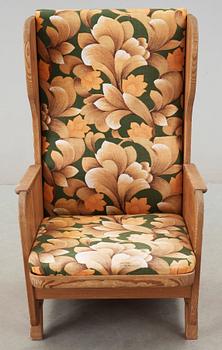 An Axel Einar Hjorth stained pine armchair 'Lovö', Nordiska Kompaniet, Sweden.