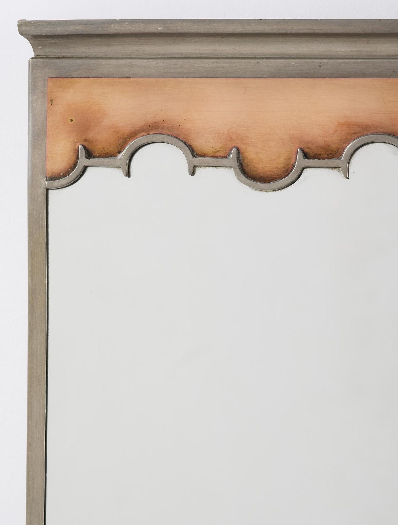 Nils Fougstedt, a rare pewter and brass wall mirror model A 679, Firma Svenskt Tenn, Stockholm, 1932.