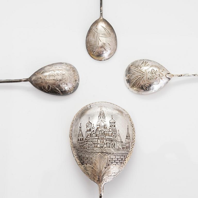 Three silver tea glass holders and four spoons, silver Kostroma and Moscow, late 19th and early 20th centuries.