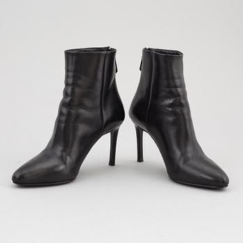 PRADA, a pair of black leather boots, size 35.
