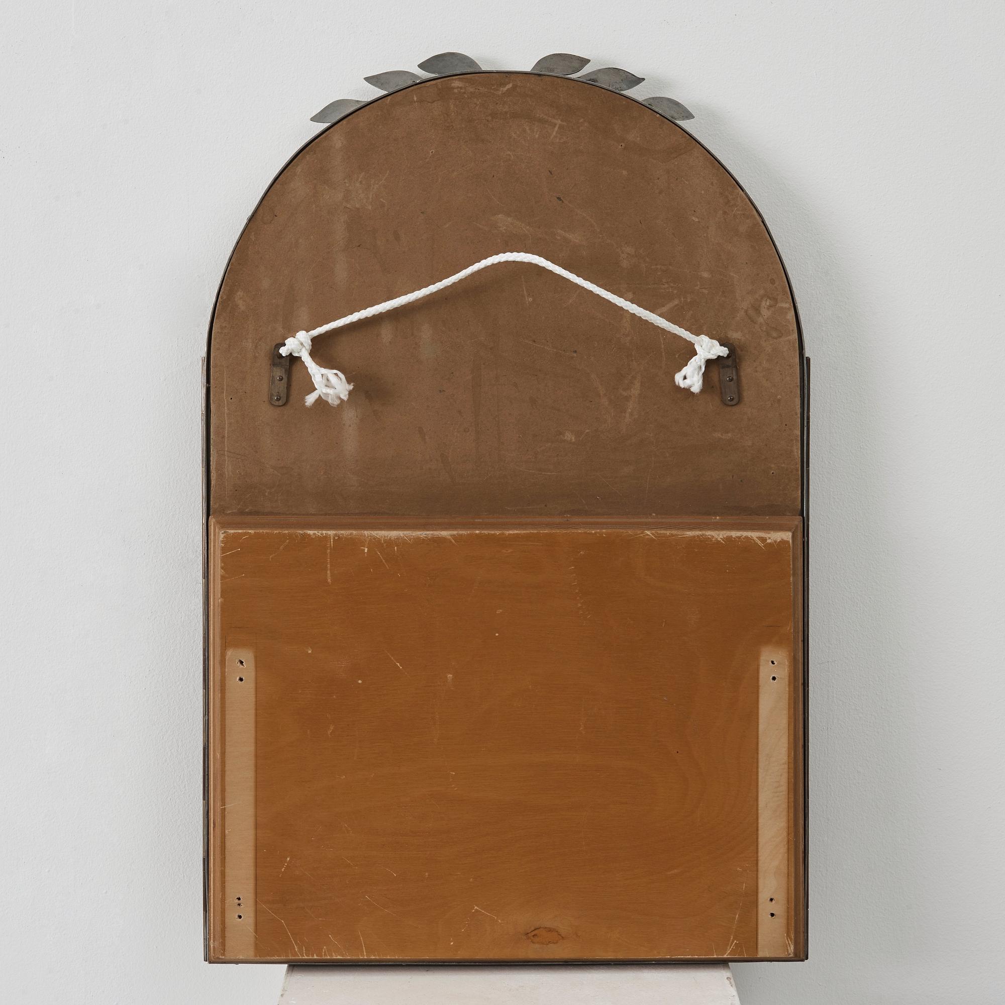 Estrid Ericson, A pewter three-piece mirror, Svenskt Tenn, Stockholm 1939, model 884.