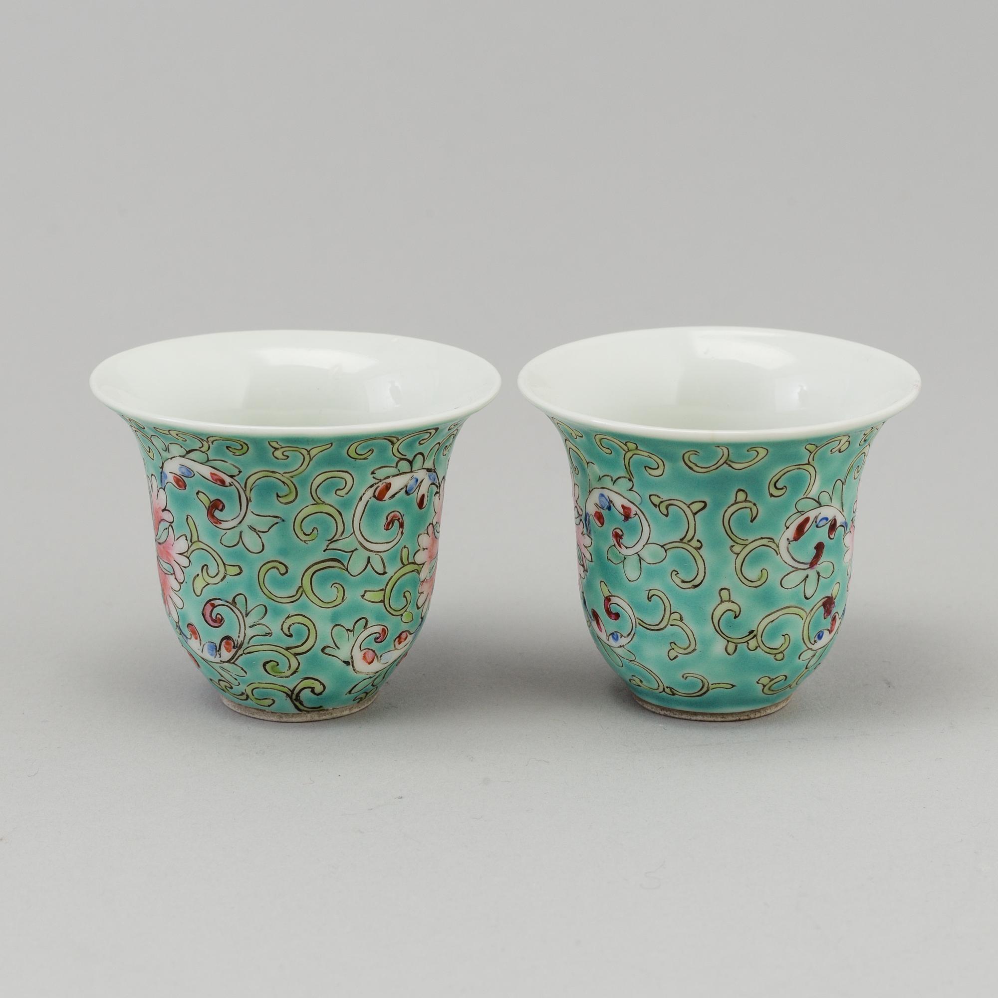 A lot of Chinese turquoise-ground porcelain vases, cups and lidded jars, 20th century.