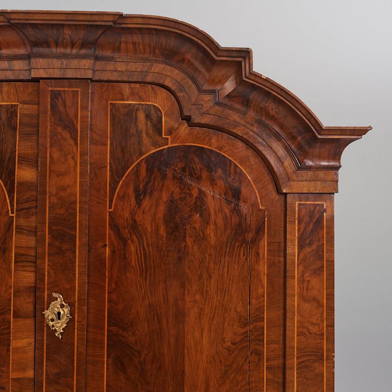 A rococo walnut parquetry cabinet, Stockholm, later part of the 18th century.