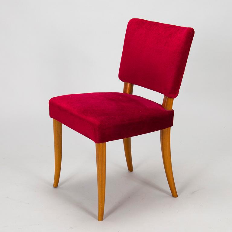 A mid 20th century dining table and a set of four chairs, Oy Boman Ab and two chairs Werner West.