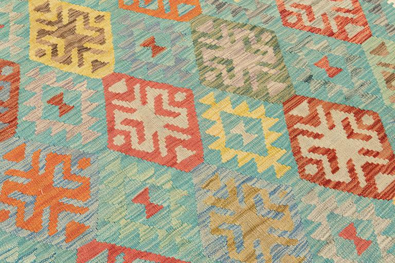 A Kilim carpet, approx. 343 x 254 cm.