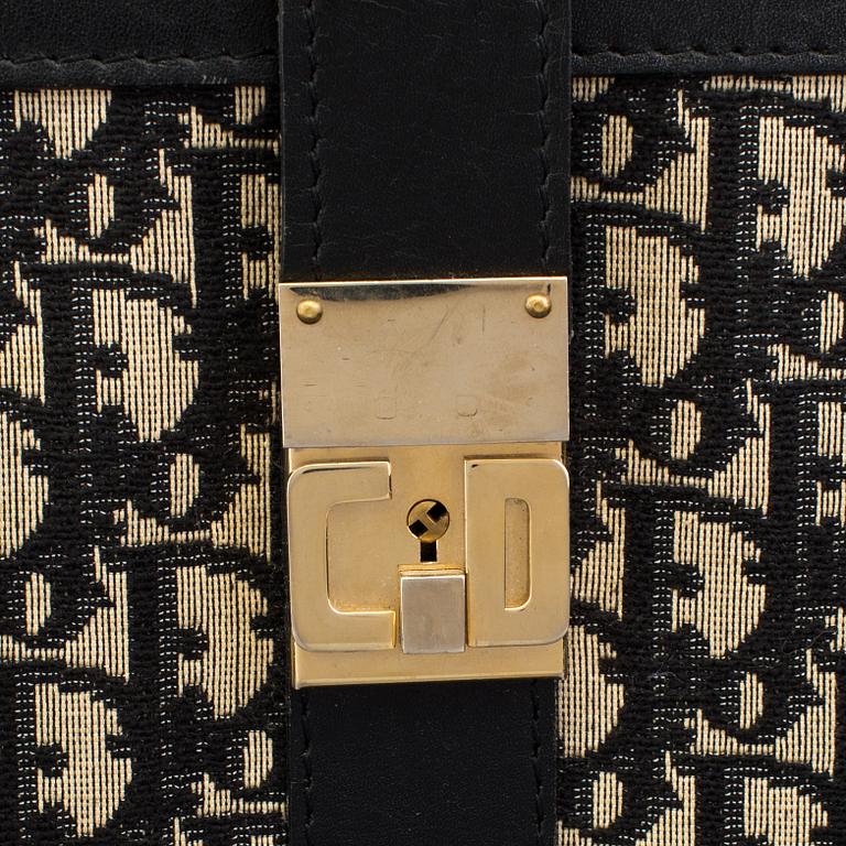 CHRISTIAN DIOR, a monogram canvas suitcase.