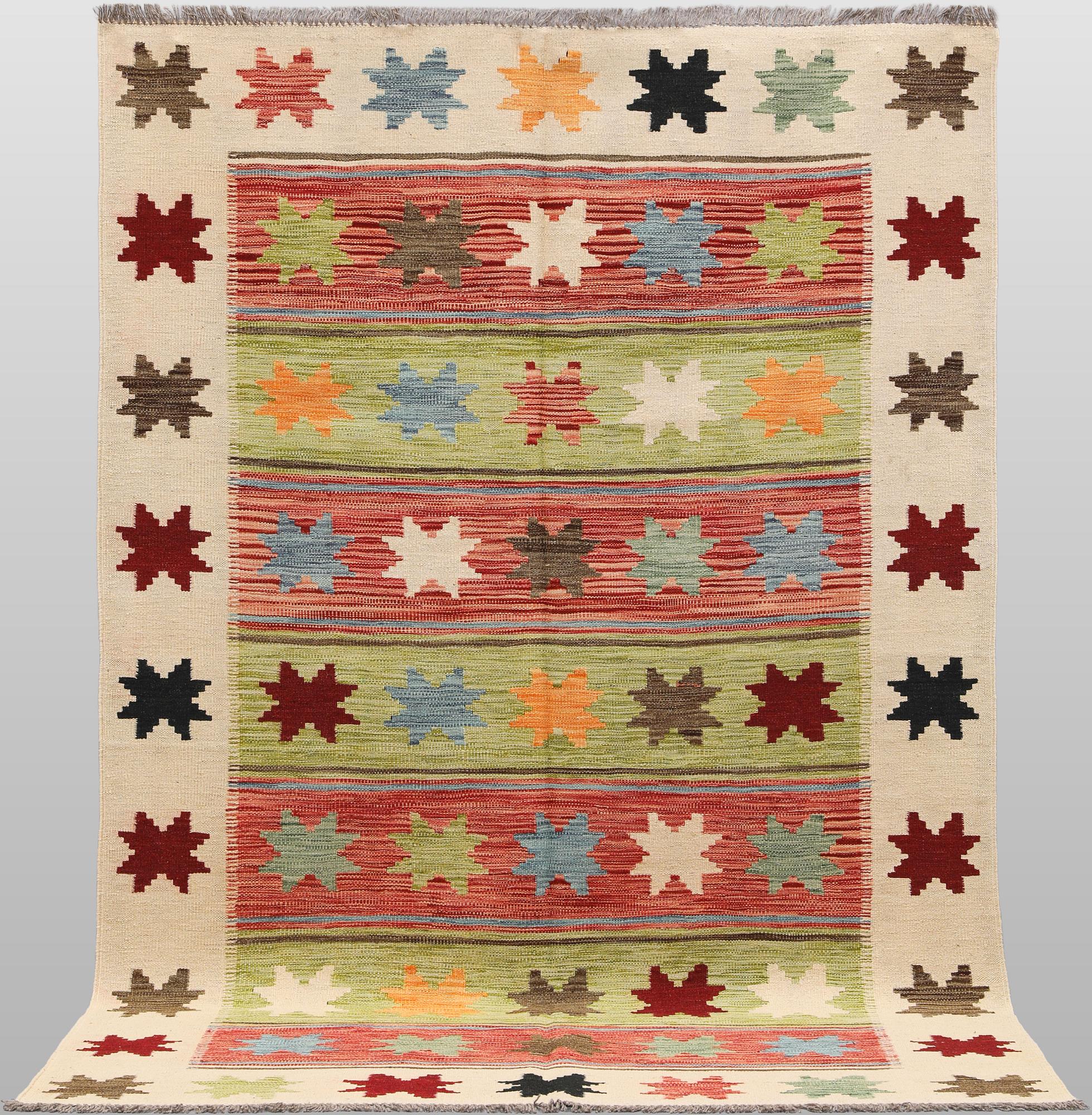 A Kilim rug, approx. 255 x 174 cm.