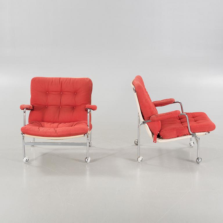 BRUNO MATHSSON, a pair of lounge chairs for Dux, model "Karin", second half of the 20th century.