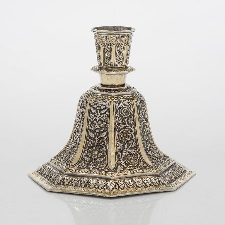 A parcel-gilt silver repoussé water pipe huqqa base, 18th/19th Century.