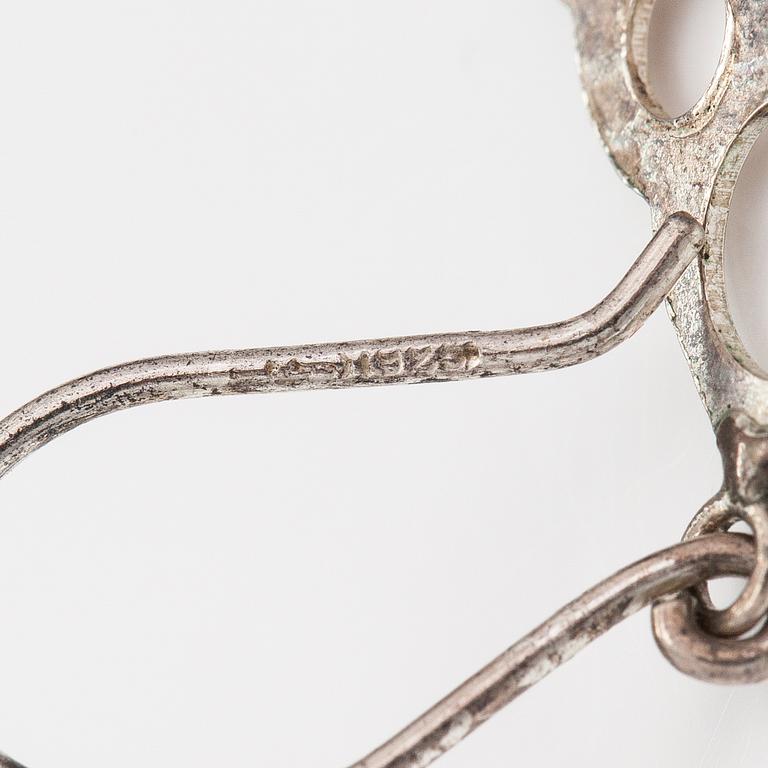 Liisa Vitali, Örhängen "Pitsi", sterlingsilver. Kultakeskus.