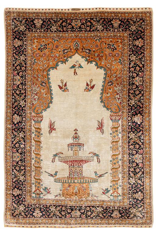 A semi-antique/old pictoral silk Hereke rug, West Anatolia, c. 152 x 103 cm.