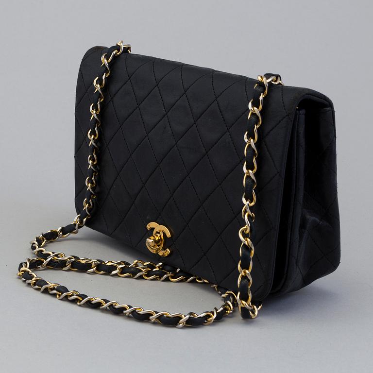 Chanel "Medium Classic Full Flap".