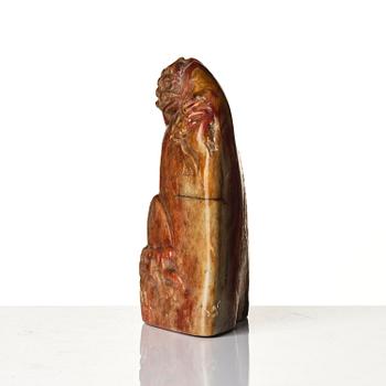 A group of carved nephrite and jade ornaments, China, Qing dynasty and older. (8 pieces).