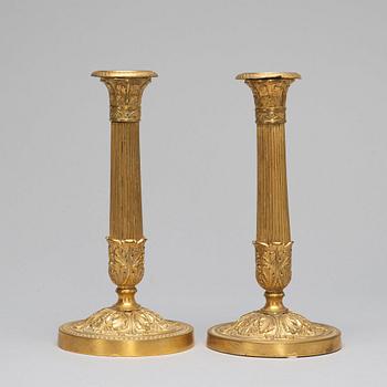 A pair of French Empire-style late 19th ct candlesticks.