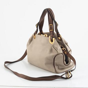 Marni, a leather handbag.