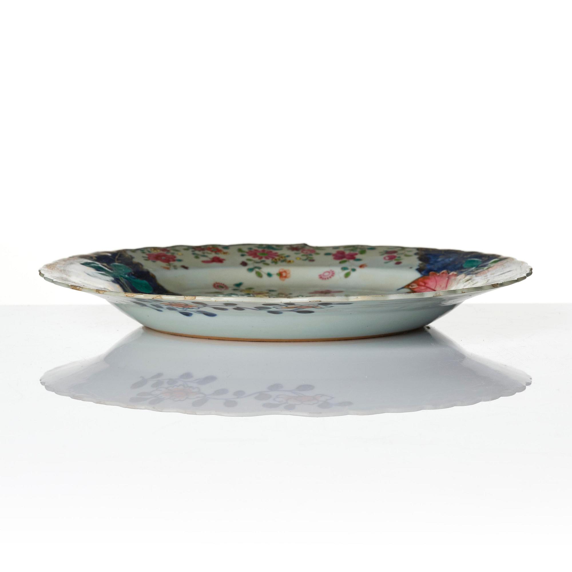 A set of three famille rose 'tobacco leaf' plates, Qing dynasty, Qianlong (1736-95).