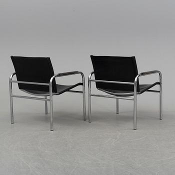 TORD BJÖRKLUND, a pair of 'Klinte' tubular steel easy chairs from IKEA.