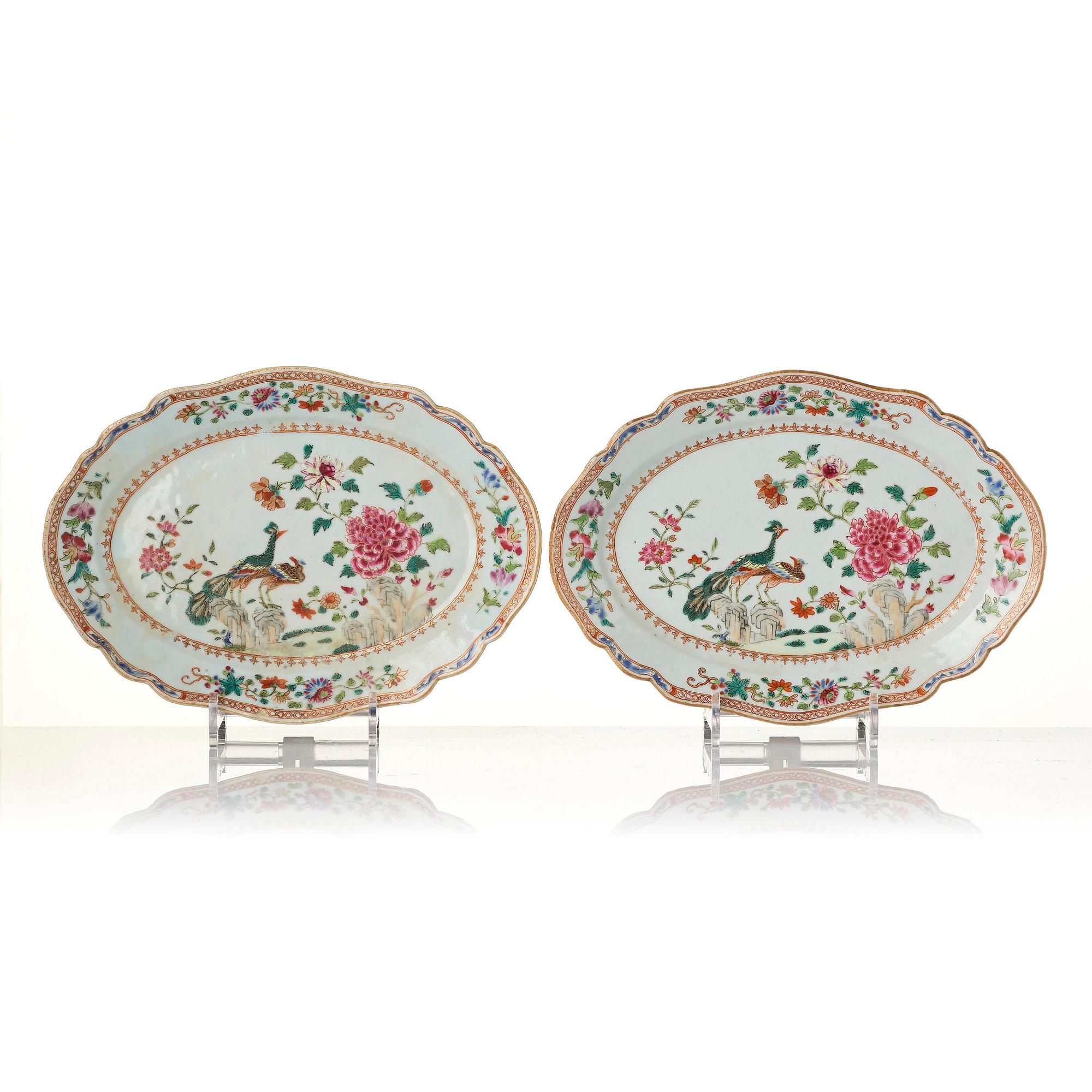 A group of famille rose 'double peacock' serving dishes, Qing dynasty, Qianlong (1736-95). (8 pieces).