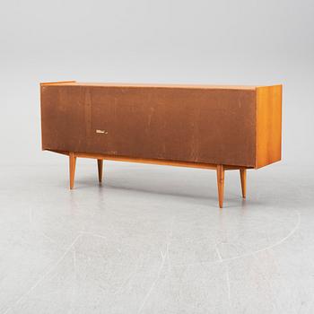 A second half of the 20th century teak veneered sideboard.