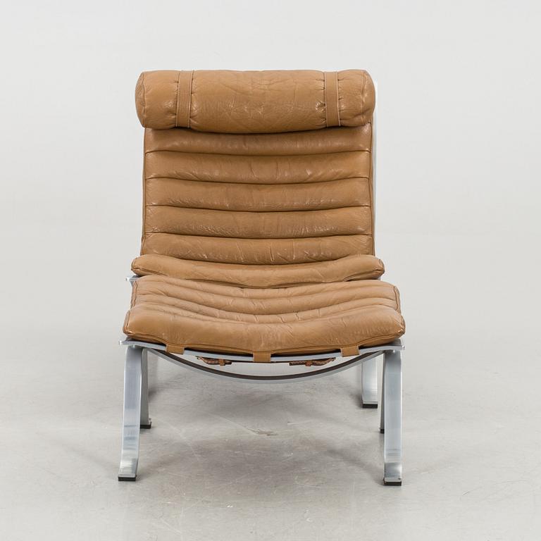 An Arne Norell "Ari" easychair and stool later part of the 20th century.